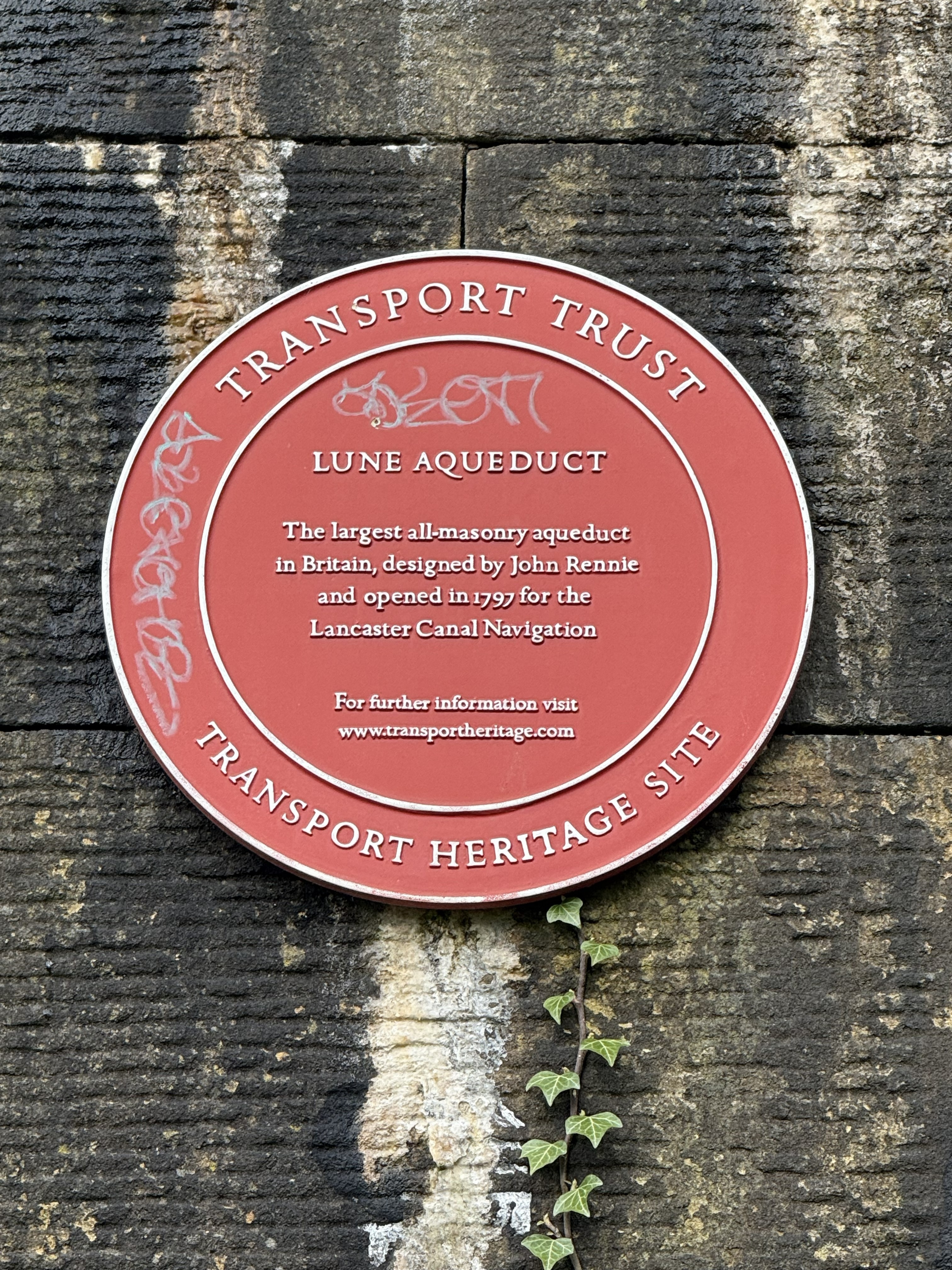 TheTransport Trust Red Wheel Plaque at The Lune Aqueduct
